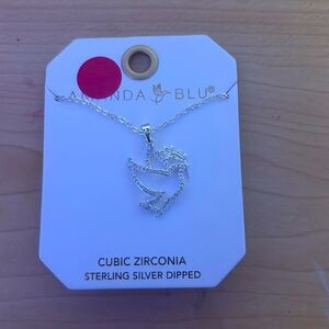 Silver dove necklace.